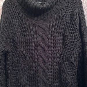 Chucky turtleneck sweater.